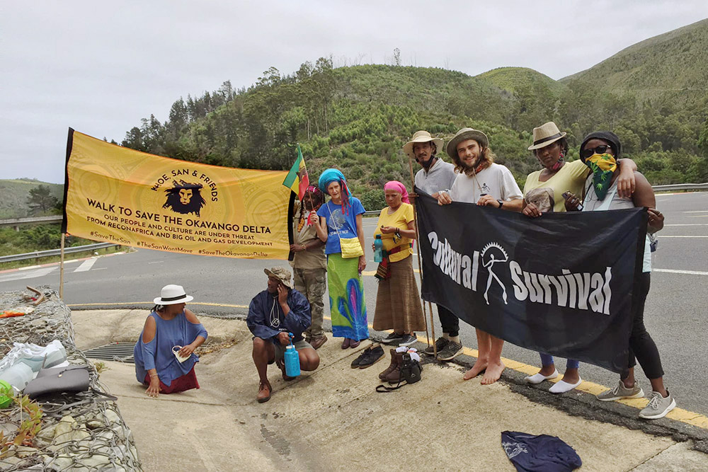 road-side protestors with signs about Okavango Delta