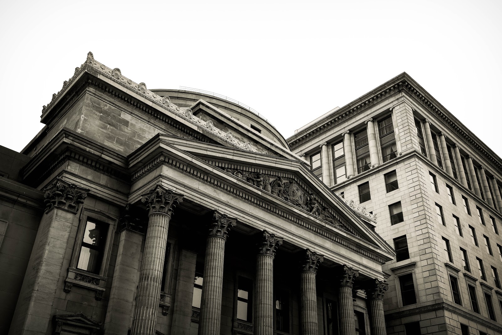 Grey office building with classical pillars